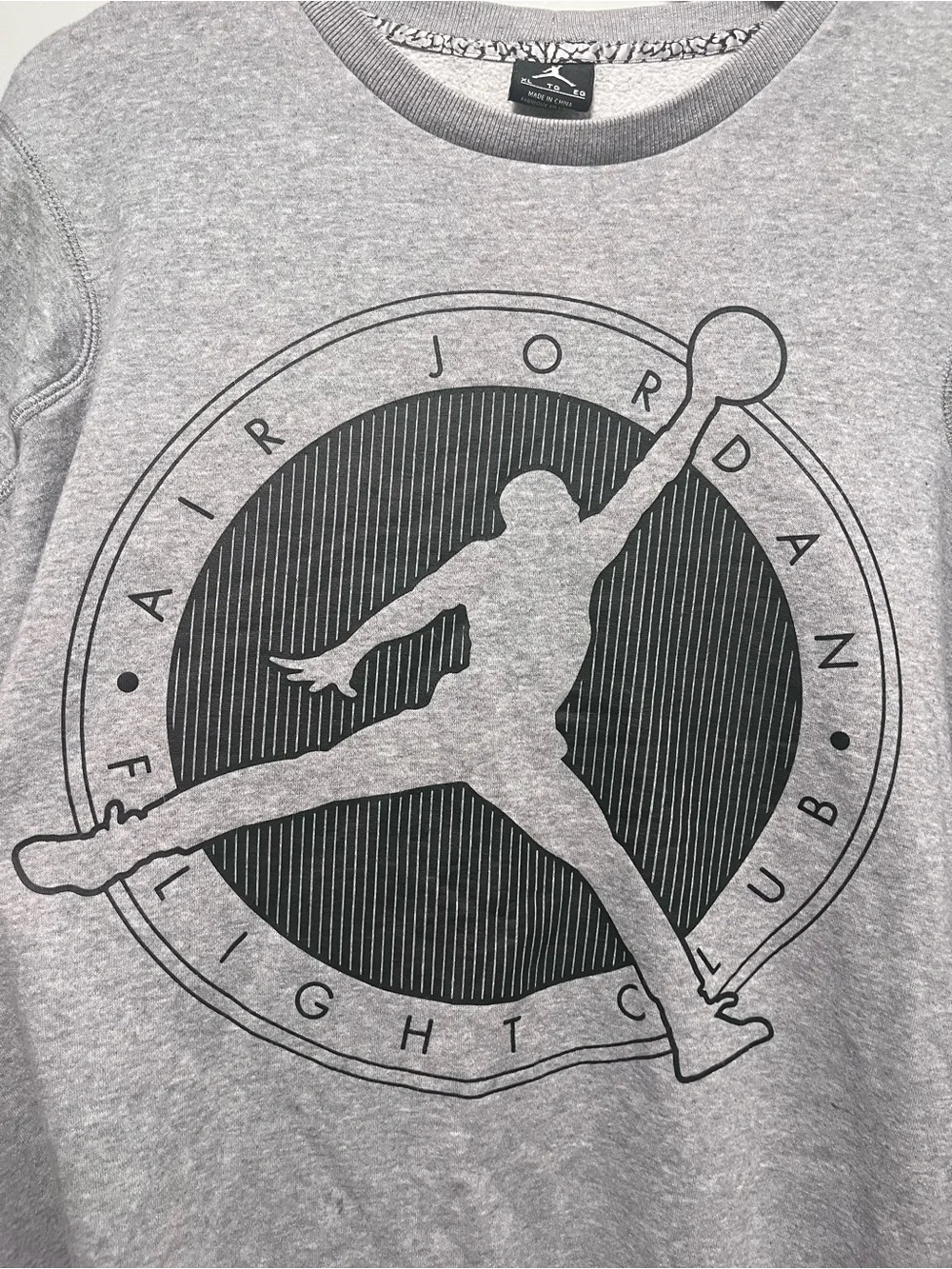 Classic Nike Air Jordan Flight Club crewneck sweatshirt in heather gray. Feature